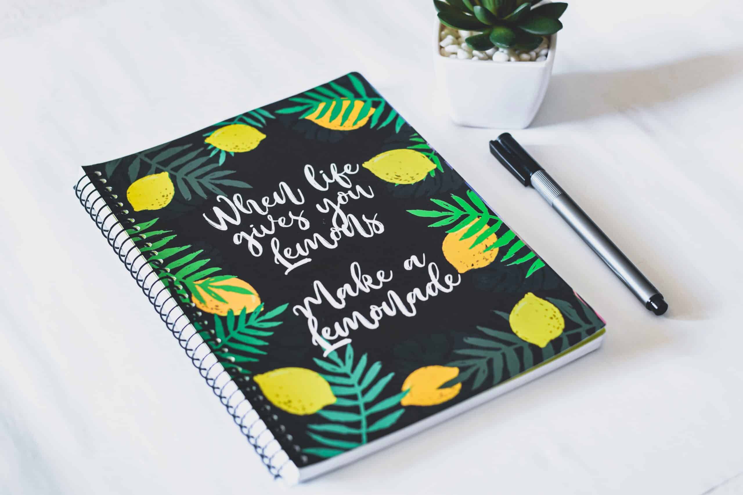 Notebook with an inspirational quote on the cover