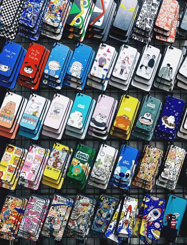 Image depicting a phone covered by a cute case
